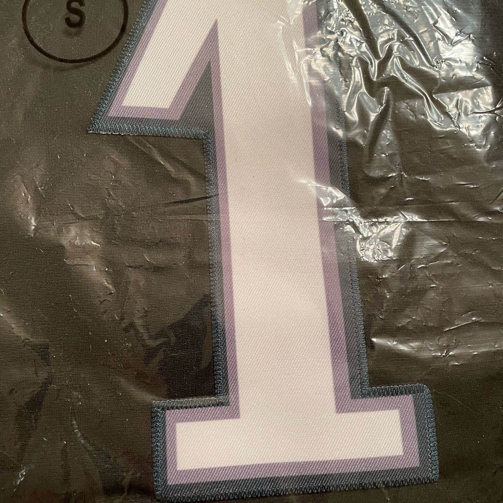 NFL Players Eagles Jersey, Men’s size Small. Still in plastic and brand new.